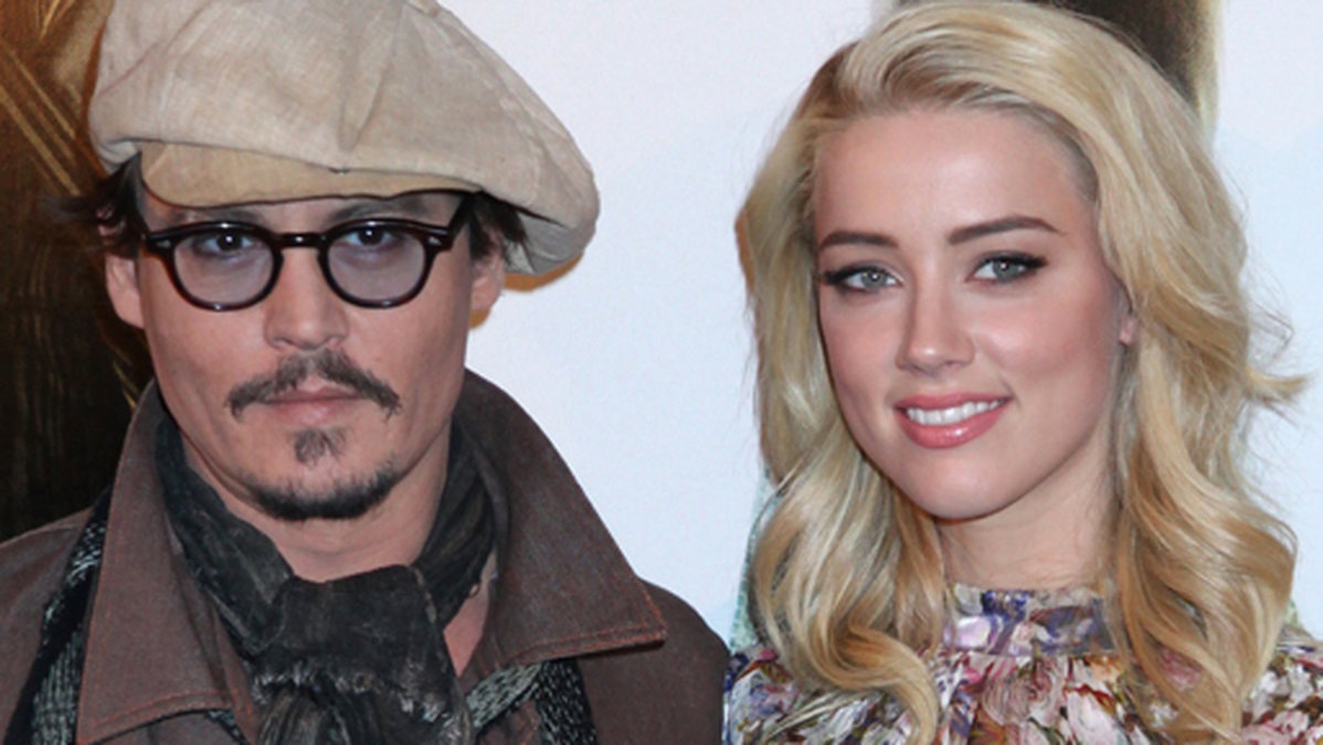 Johnny Depp och Amber Heard på filmpremiär. 