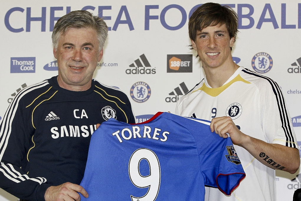 Torres tillsammans med sin nya manager.