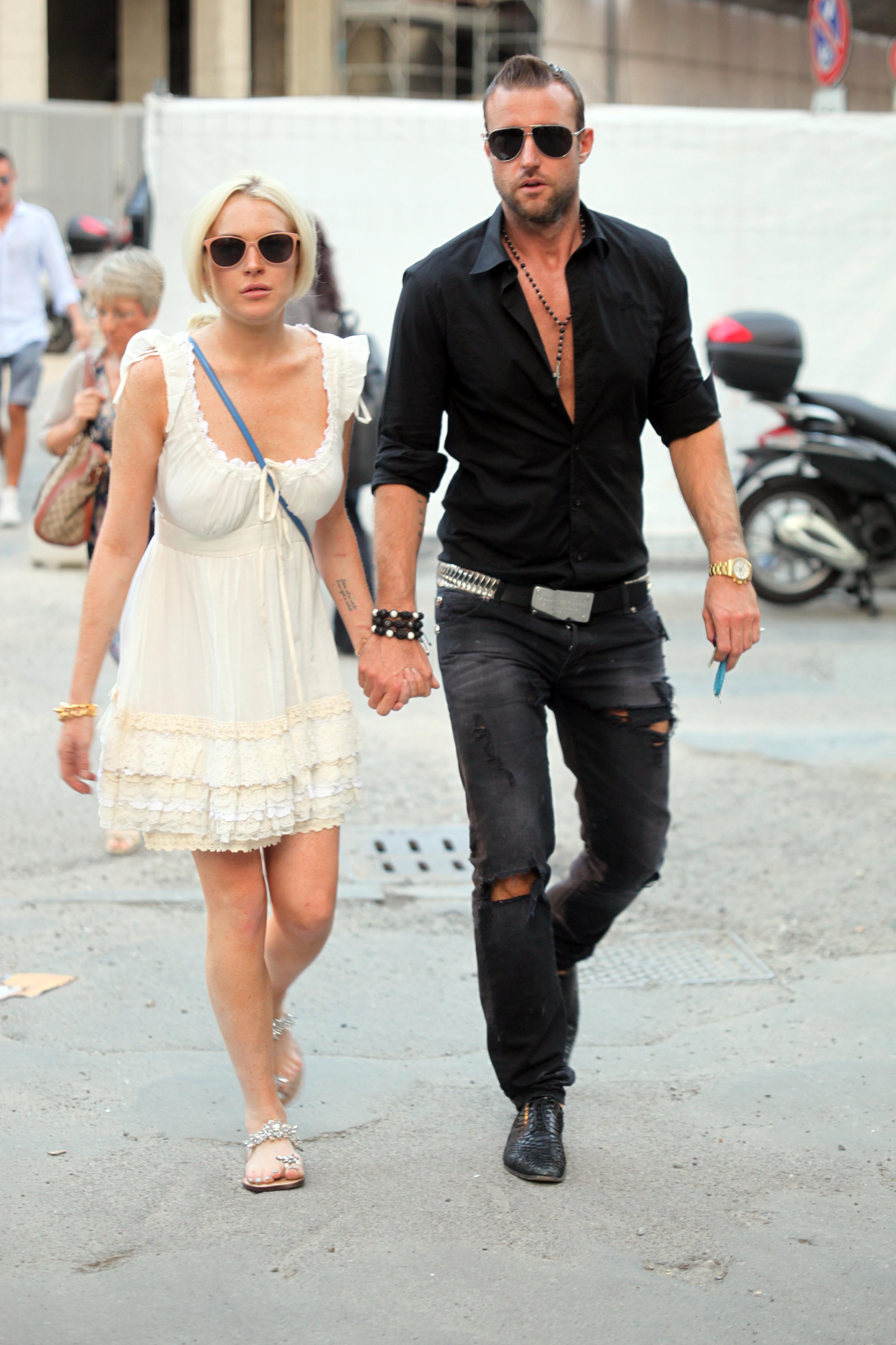 I september traskade Lindsay och designern Philipp Plein runt hand i hand i Italien. 