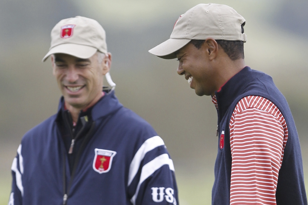Tiger Woods tillsammans med USA:s kapten Corey Pavin.