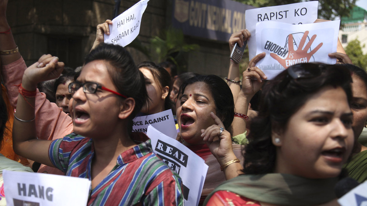Kvinnan våldtogs av tretton män som straff för att ha blivit kär i "fel" man.