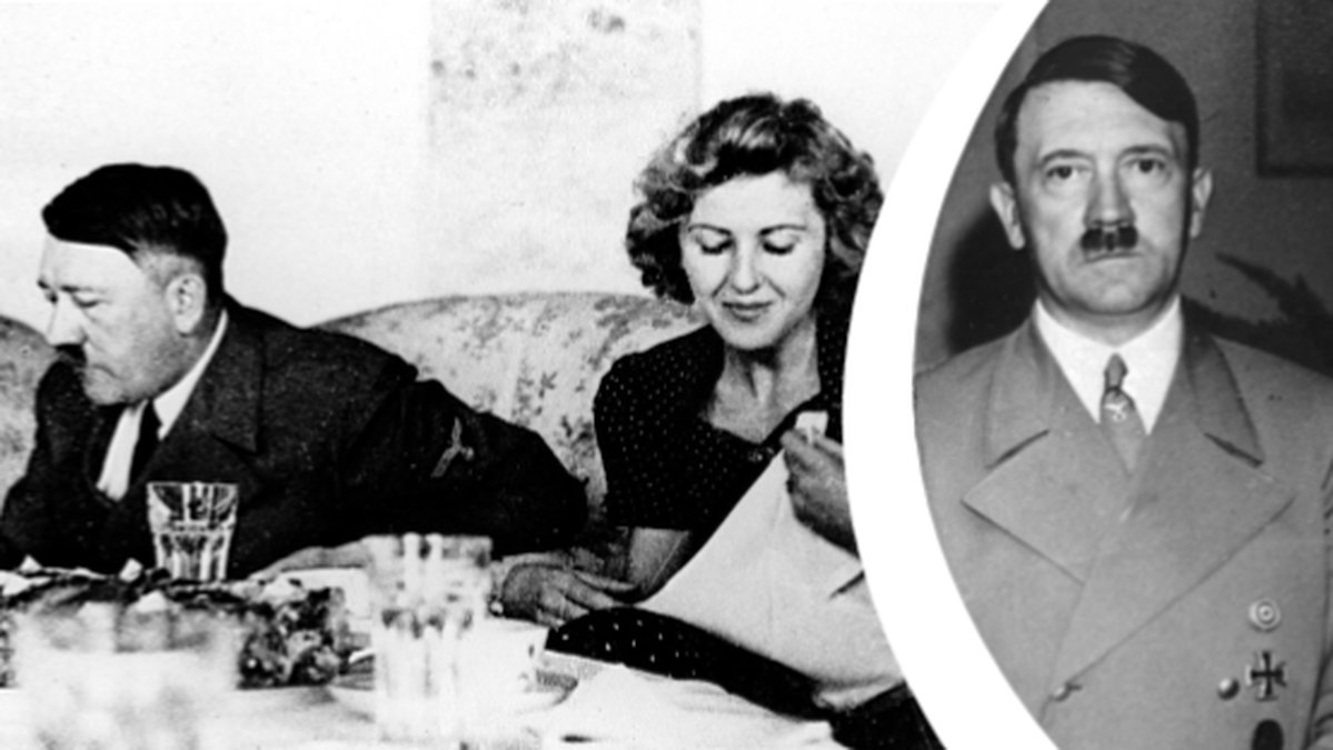 Adolf Hitler och Eva Braun äter. Adolf Hitler i uniform.