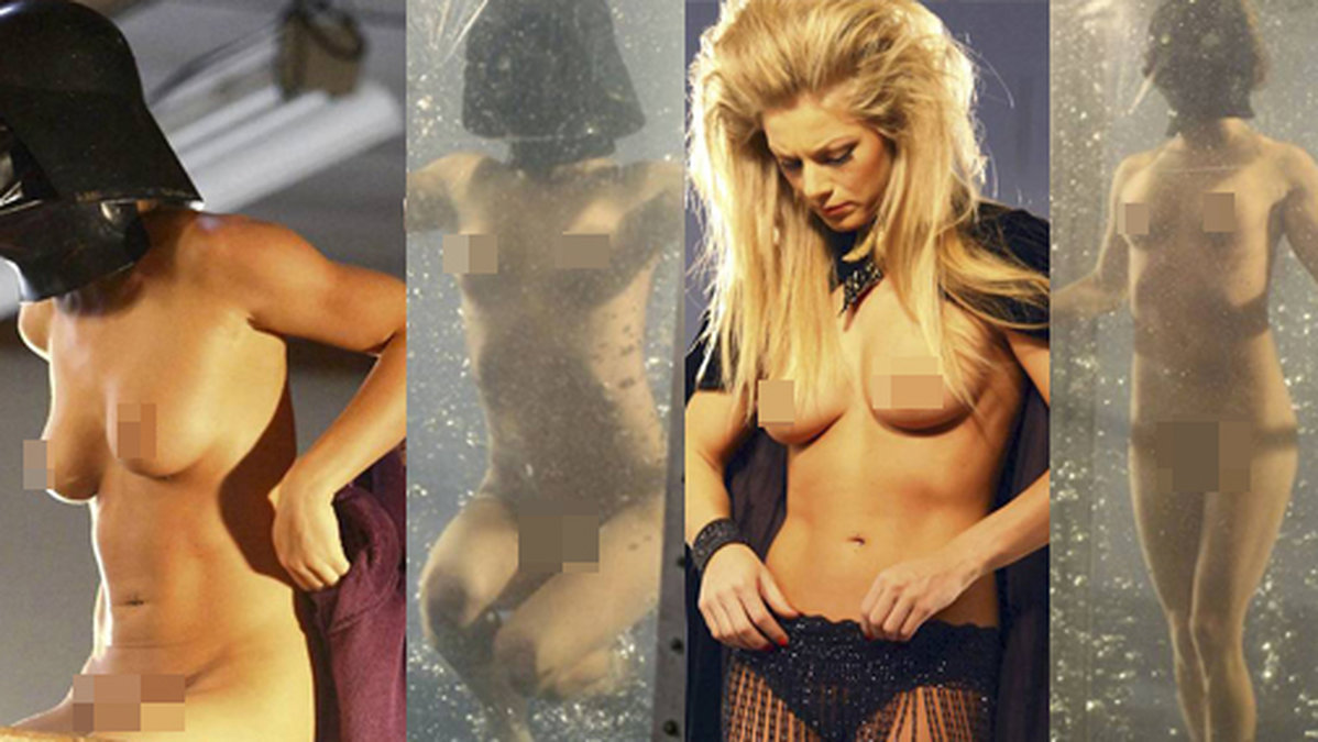Nikki Leigh poserar i en vattentank. OBS: Varning för ocensurerade bilder.