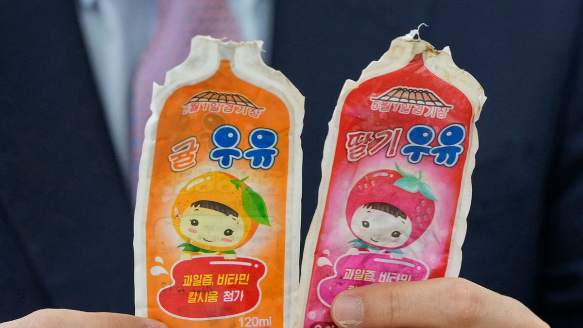 Mjölk med mandarin- och jordgubbssmak från Nordkorea. Arkivbild från april 2022.