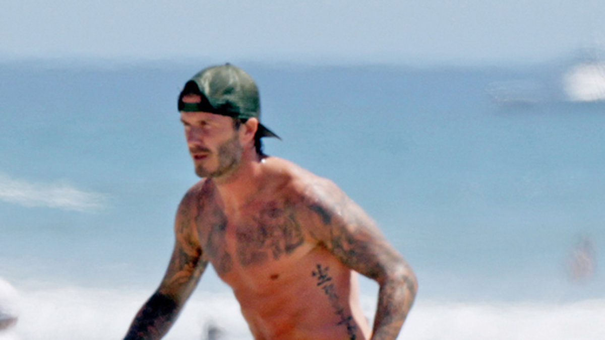 David Beckham chillade på stranden.