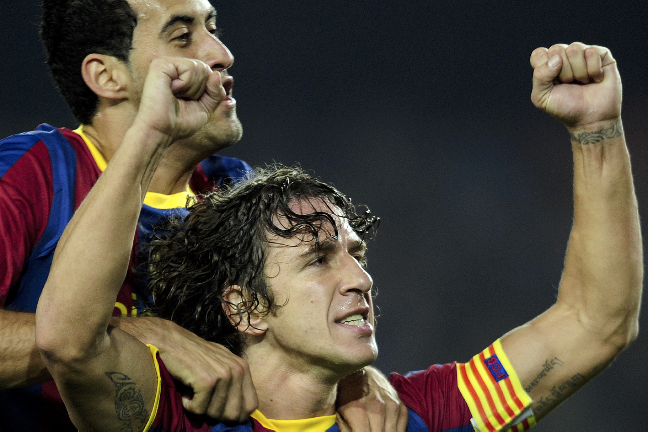 Carles Puyol jublar efter ett mål mot Valencia. Carles Puyol jublar efter ett mål mot Valencia.