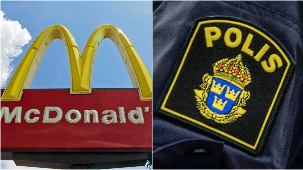 Poliskonstapel och McDonald's-skylt