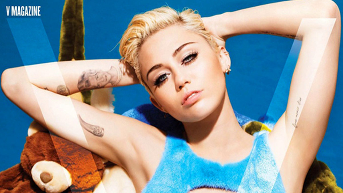 Miley pryder omslaget på tidningen V.