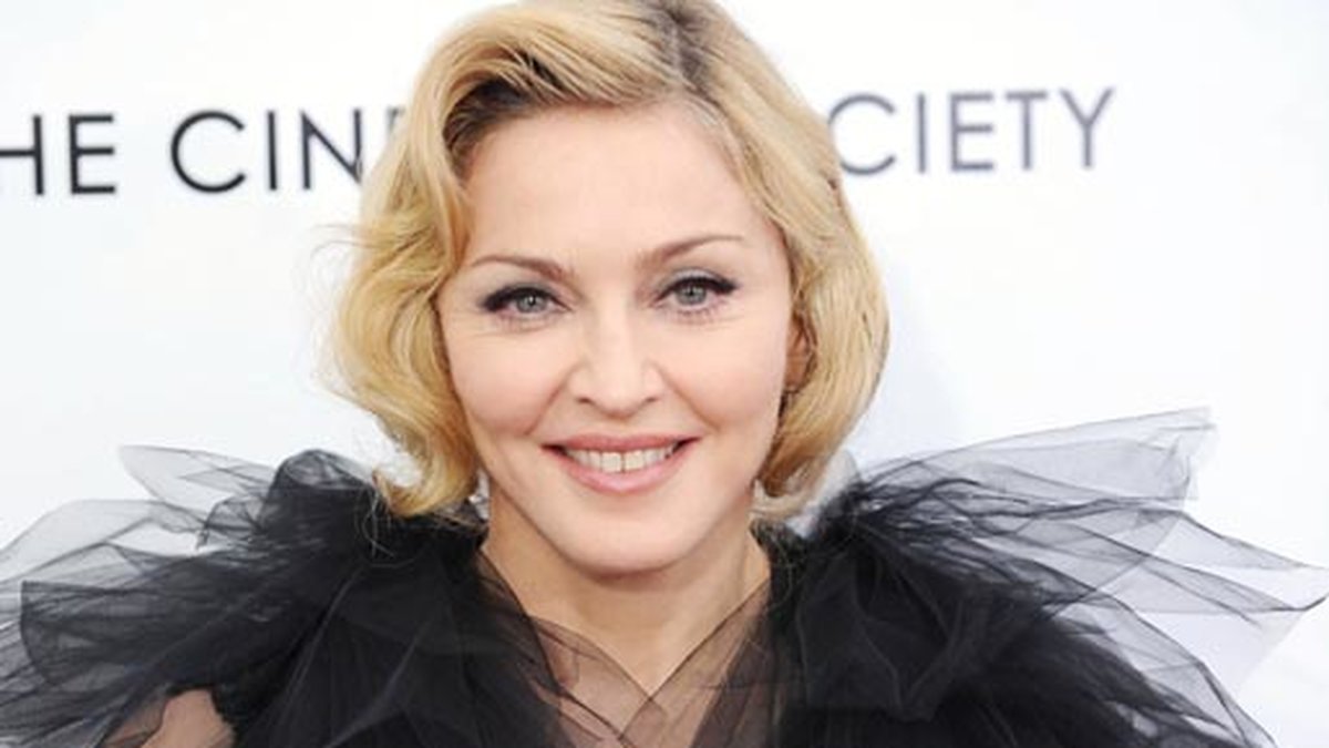 Madonna på mingel i januari 2012. Det är tyll, det är smink, det är juveler och perfekt hår.