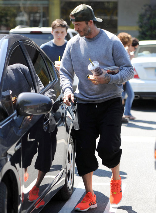 David Beckham har varit på gymmet med sin son Brooklyn. David Beckham har varit på gymmet med sin son Brooklyn.