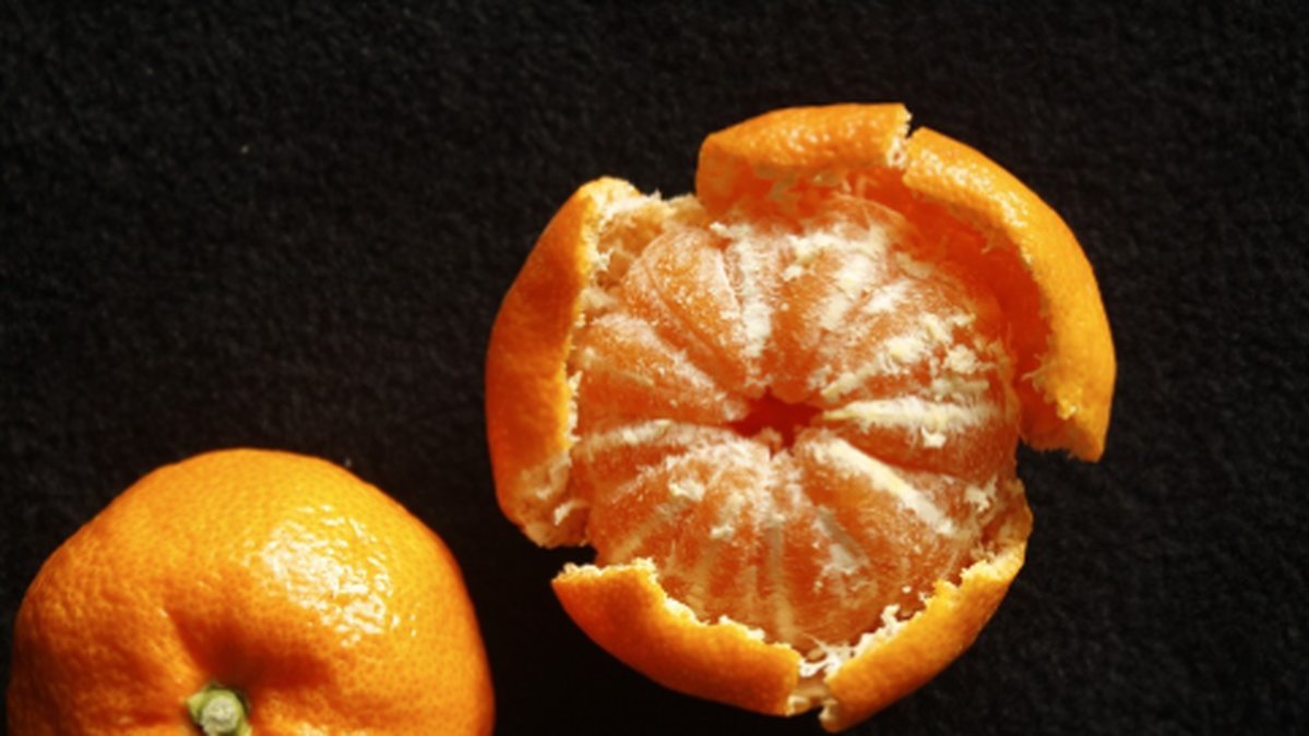 Lyckan när du skalar en mandarin i ett svep utan att skalet går sönder i bitar.