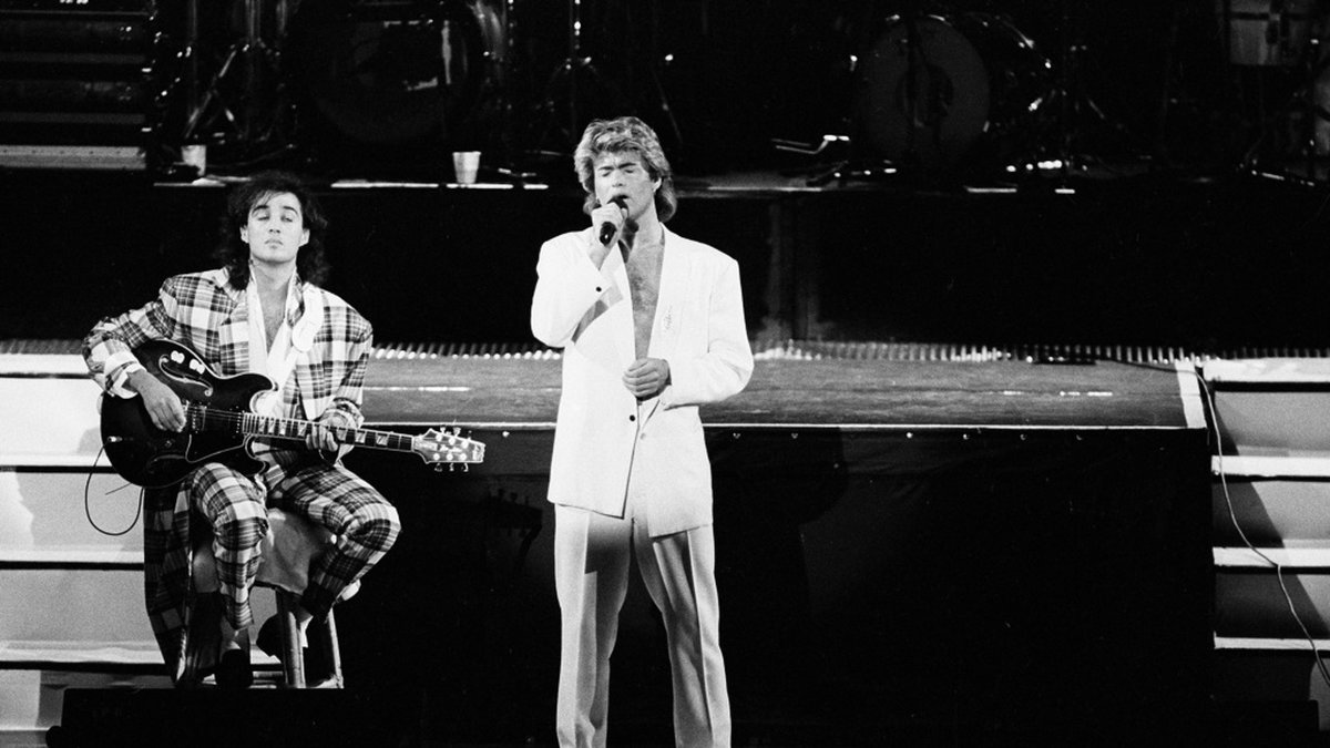 George Michael och Andrew Ridgeley utgjorde 80-talsduon Wham. Bilden är från en konsert i Peking 1985.