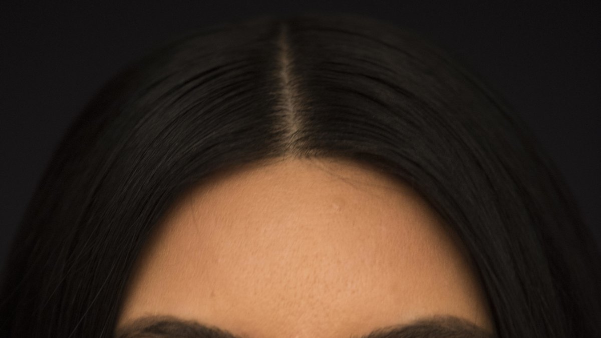 Kim Kardashian med sina höga kindben och välformade ögonbryn ska, enligt studien, betrakas som pålitlig.
