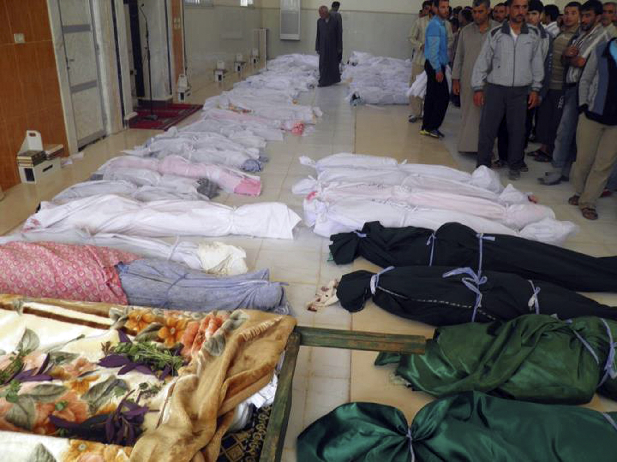 Över 16 000 syrier har mördats sedan i mars 2011. Här är en bild från en massaker i staden Houla där86 personer dödades.