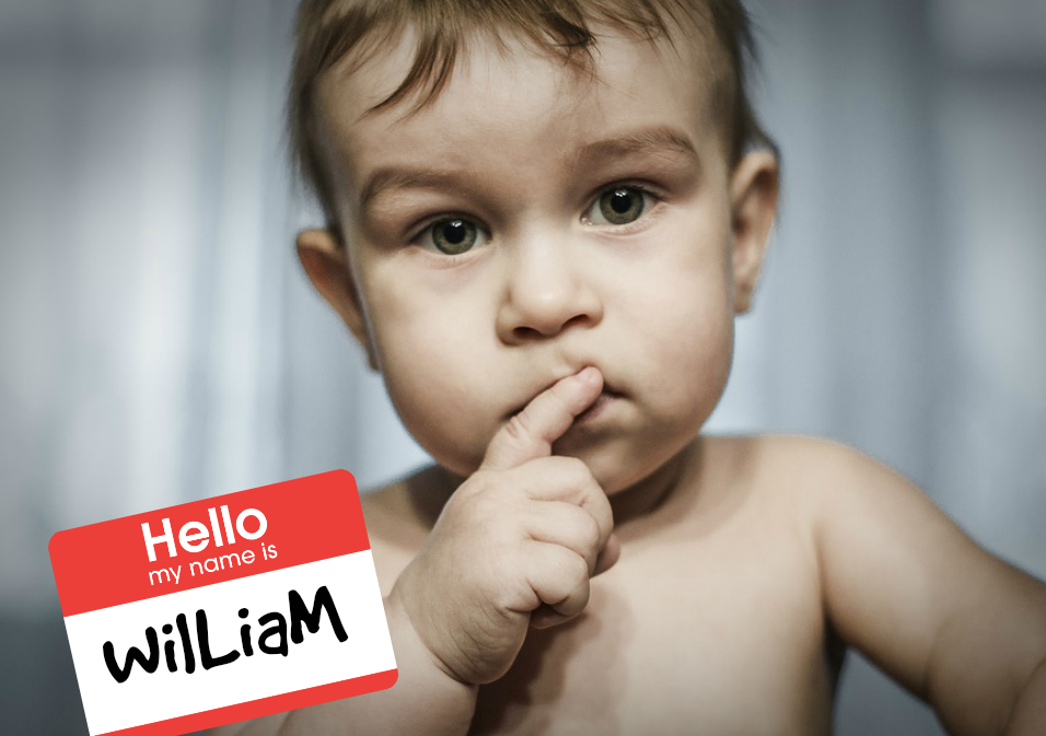 Bild på liten pojke med namnskylten som säger Bild på liten pojke med namnskylten som säger