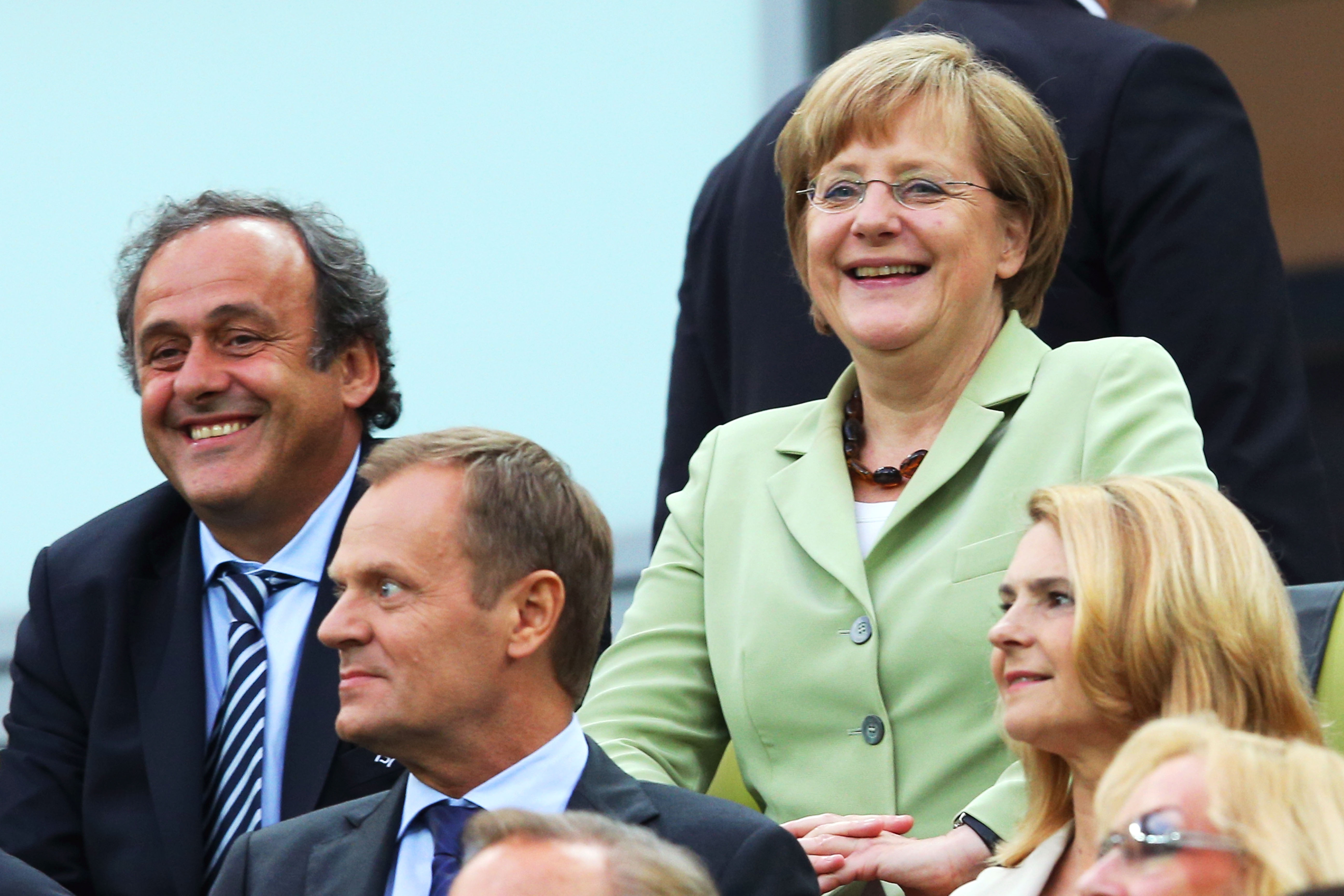 Tysklands förbundskansler trivdes med Uefas president Michel Platini. Tysklands förbundskansler trivdes med Uefas president Michel Platini.